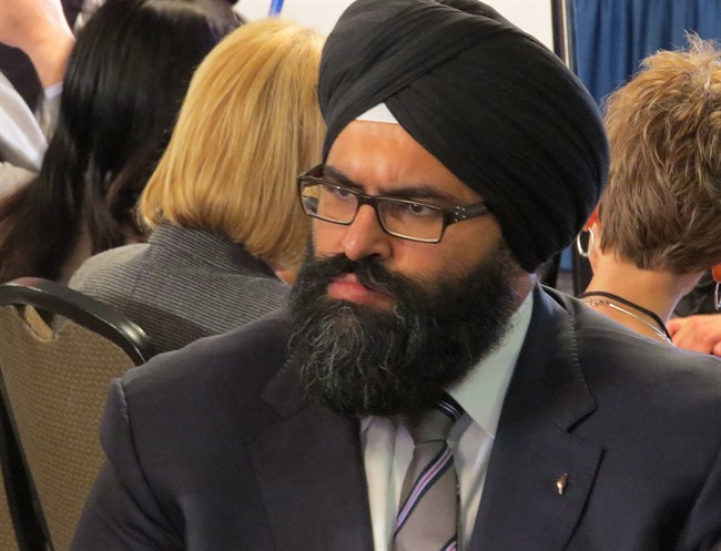Alberta Human Services Minister Manmeet Bhullar listens in on group discussions in Edmonton, Wednesday, Jan.29, 2014 around changing provincial privacy laws to allow more information to be published on the deaths of children in government care. The minister was attending a conference on the topic, which was spurred by the recent revelation in media stories that Alberta had used sweeping privacy laws to cover up the deaths of 89 children in care since 1999.