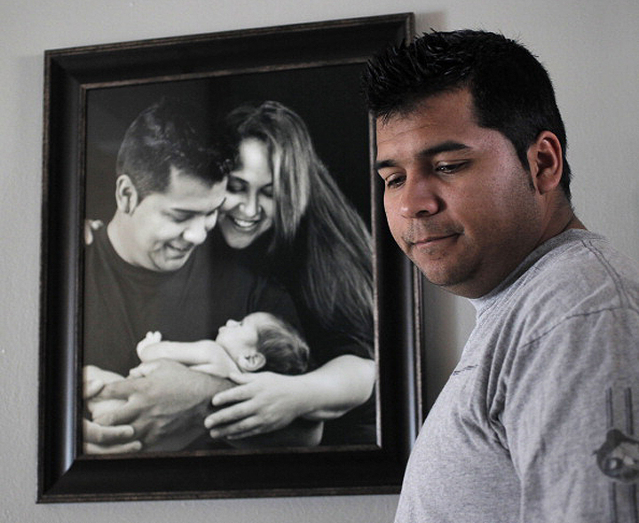 Erick Munoz, the husband of Marlise Machado Munoz, poses for a photo at his home on Jan. 3, 2014.
