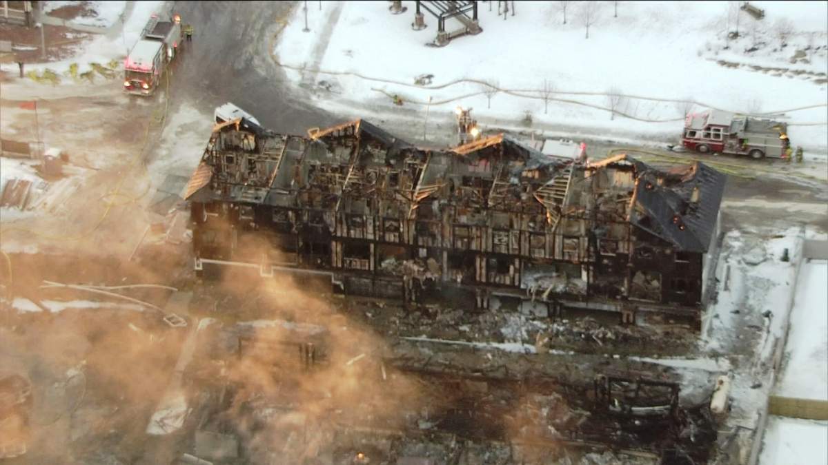 Emergency crews battle a blaze in Panorama Hills that destroyed several condo buildings on Friday, January 10, 2014.