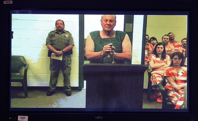 Curtis Reeves appears via video conference before Circuit Judge Lynn Tepper in Wesley Chapel, Fla. on Tuesday, Jan. 14, 2014. 
