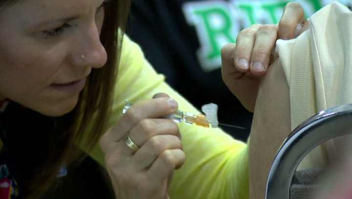 Saskatoon Health Region is holding a mass immunization clinic after a spike in flu cases.