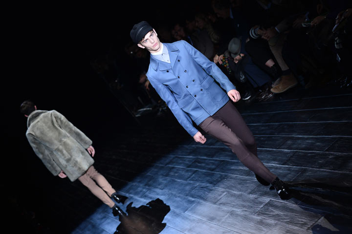 A model presents a creation for fashion house Gucci as part of Autumn/Winter 2014 Milan Collections during the Men’s fashion week on January 13, 2014 in Milan. (Photo credit: GIUSEPPE CACACE/AFP/Getty Images)