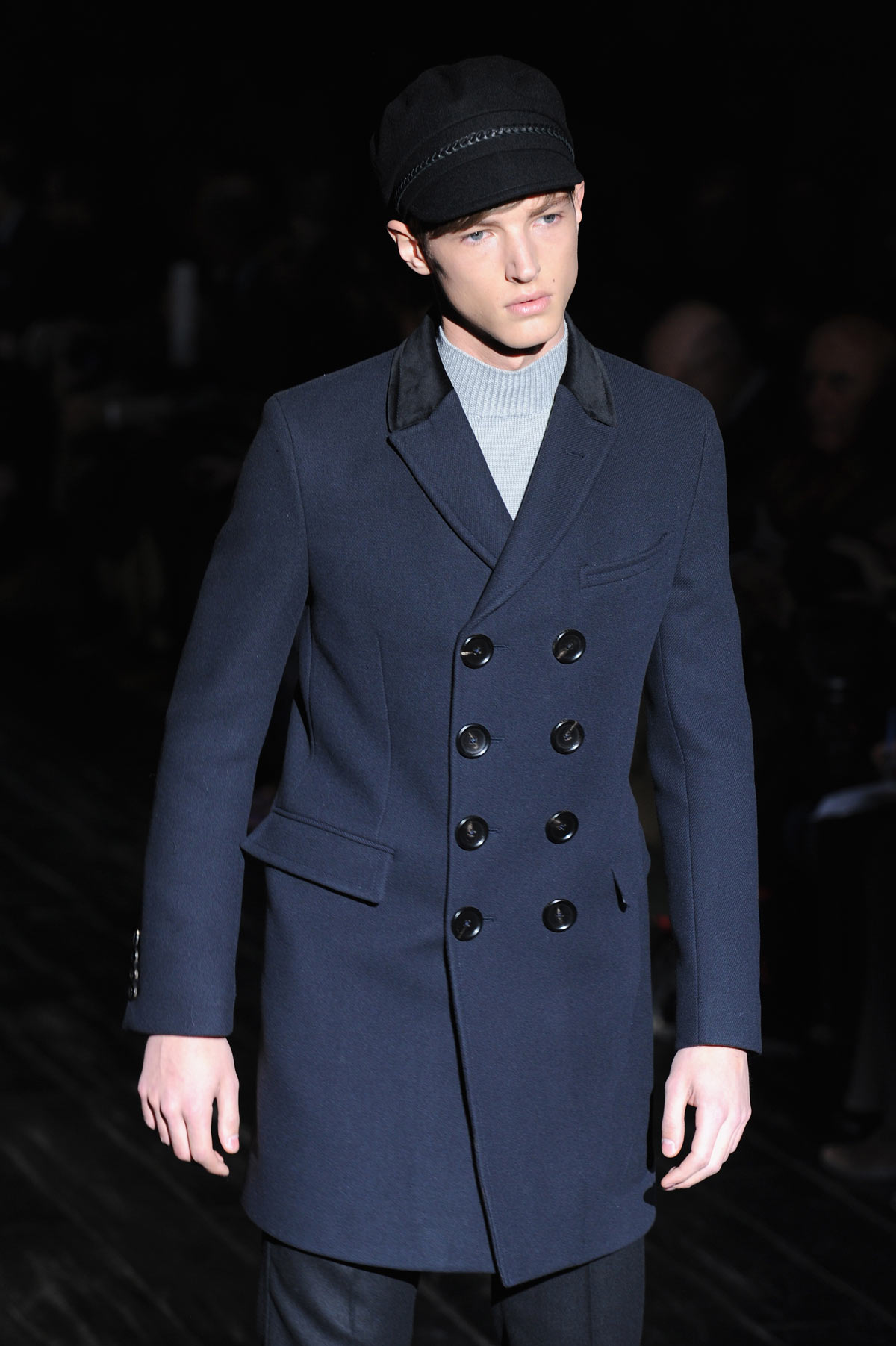A model walks the runway during the Gucci show as a part of Milan Fashion Week Menswear Autumn/Winter 2014 on January 13, 2014 in Milan, Italy.