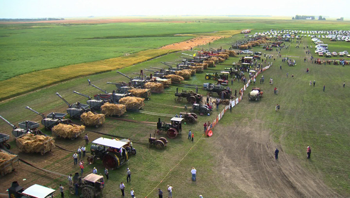 Vintage threshing world record set in Saskatchewan raises $135,000 for Canada Foodgrains bank to help end world hunger.