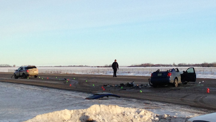 Highway 11 northbound was closed for several hours north of Saskatoon on Jan.. 16, 2014 after a crash between a car and a police SUV left a woman with serious injuries.