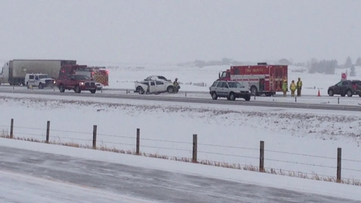 Snow and ice-covered roads cause collisions on the QEII north of Calgary on Wednesday, January 29, 2014.