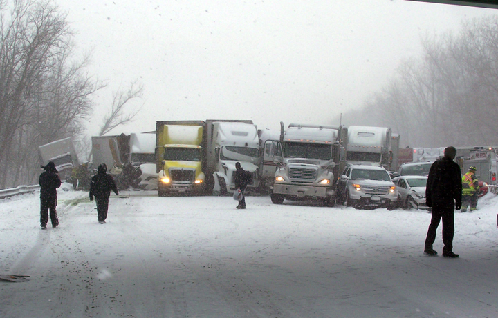 This photo provided by the Indiana State Police on Thursday, Jan 23, 2014, shows the scene of a multi-vehicle crash involving several trucks and cars in Porter, Ind.