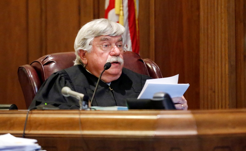 Hinds County Circuit Court Judge Bill Gowan reads the jury their instructions for deliberations in the depraved-heart murder trial of Natasha Stewart, also known as Pebbelz Da Model, in Jackson, Miss., Friday, Jan. 31, 2014. (AP Photo/Rogelio V. Solis).