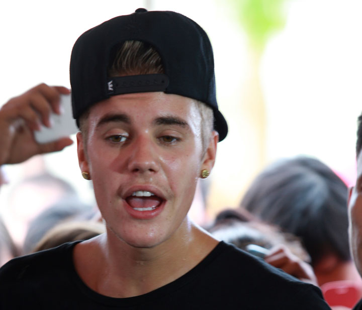 Justin Bieber, pictured visiting a school affected by the typhoon in the Philippines in December 2013.