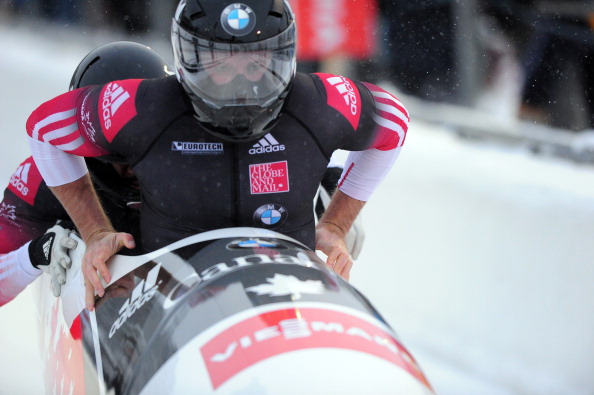  Justin Kripps and Bryan Barnett of Canada start their 2 Man Bobsled run during the Viessmann IBSF Bobsled and Skeleton World Cup event at Utah Olympic Park December 6, 2013 in Park City, Utah. 
