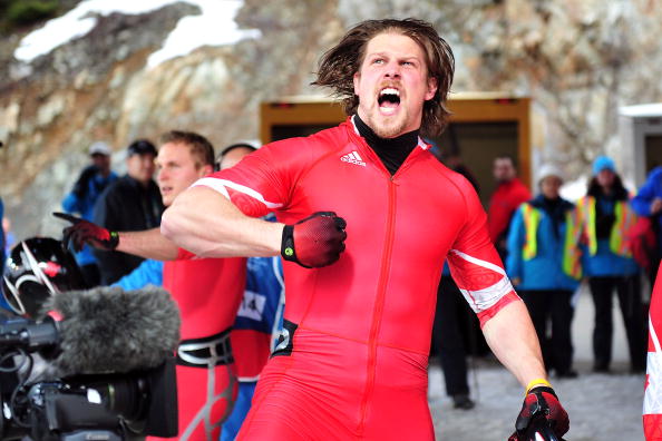 Jesse Lumsden of Canada 2 celebrates after completing heat 4 during the men's four man bobsleigh on day 16 of the 2010 Vancouver Winter Olympics at the Whistler Sliding Centre on February 27, 2010 in Whistler, Canada.  