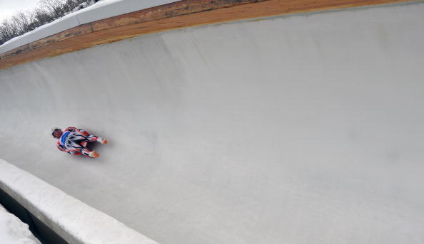 Mitchel Malyk of Canada enters turn four in the Men's Luge competition during day 2 of the Viessmann Luge World Cup event at Utah Olympic Park December 14, 2013 in Park City, Utah.