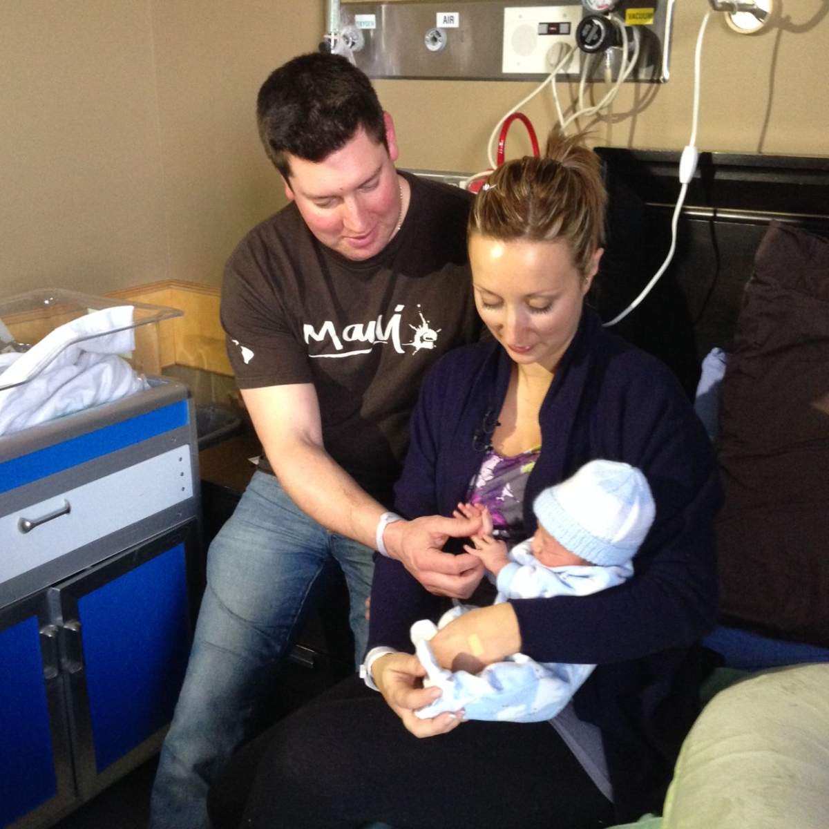Jeff and Erin McAdam with their first child, Kael Hudson.