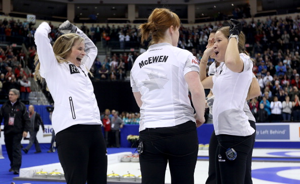 Team Jones celebrates after winning the Women's Final against Team Middaugh at the Roar of the Rings Canadian Olympic Curling Trials on December 7, 2013 at MTS Centre in Winnipeg, Manitoba.