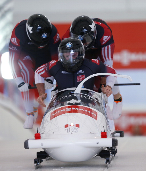 Justin Kripps, James McNaughton, Timothy Randall and Graeme Rinholm of Canada compete in the men's four man bobsleigh first run during the 2013 IBSF World Cup race November 30, 2013 in Calgary.