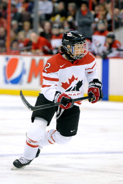  Meaghan Mikkelson #12 of Team Canada skates during the IIHF Womens World Championship Semi-Final  game against Team Russia at Scotiabank Place on April 8, 2013 in Ottawa.