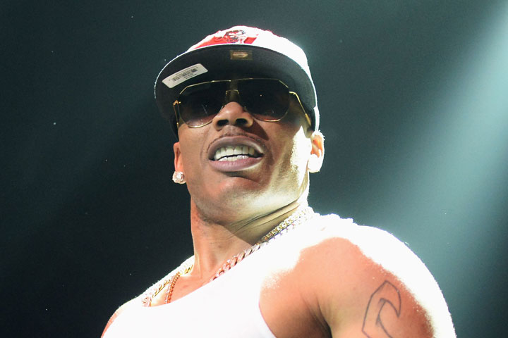 Nelly, pictured in June 2013, says it's getting "Hot in Herre.".