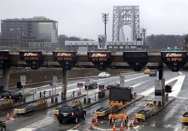 This Jan. 11, 2014, file photo shows traffic passing through the toll booths at the George Washington Bridge, in Fort Lee, N.J. Gov. Chris Christie made inaccurate statements during a news conference about the lane closures near the George Washington Bridge, according to a letter released Friday, Jan. 31, 2014, by a lawyer for a former Christie loyalist who ordered the closures and resigned amid the ensuing scandal that has engulfed the New Jersey governor's administration. 