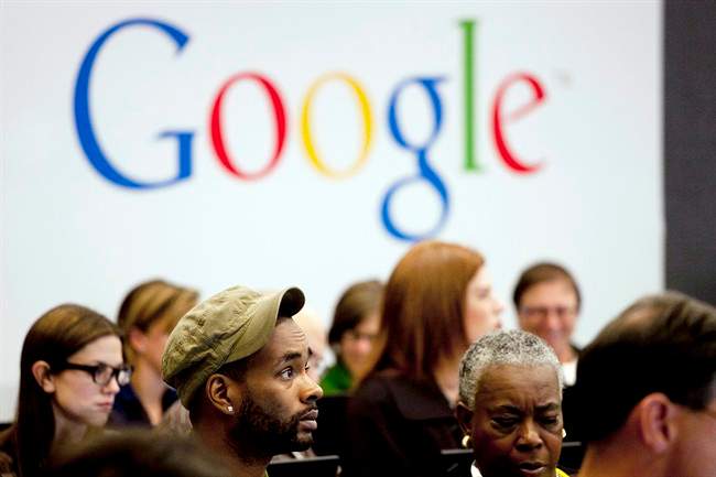 In this Wednesday, Oct. 17, 2012, file photo, people attend a workshop, "New York Get Your Business Online," at Google offices in New York. Google Inc. reports quarterly earnings on Thursday, Jan. 30, 2014. (AP Photo/Mark Lennihan, File).