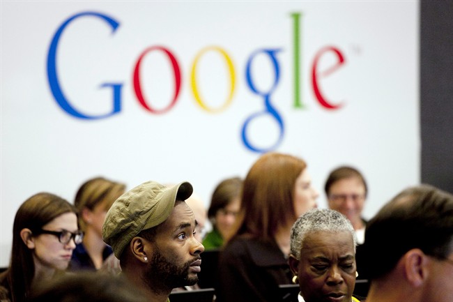 In this Wednesday, Oct. 17, 2012, file photo, people attend a workshop, "New York Get Your Business Online," at Google offices in New York. Google Inc. reports quarterly earnings on Thursday, Jan. 30, 2014. (AP Photo/Mark Lennihan, File).