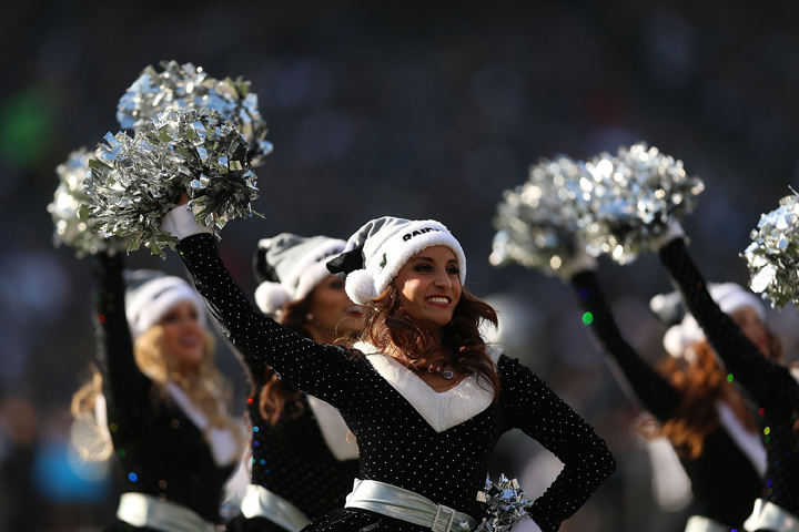 Cheerleaders of the Oakland Raiders perform at O.co Coliseum on December 15, 2013 in Oakland, California.