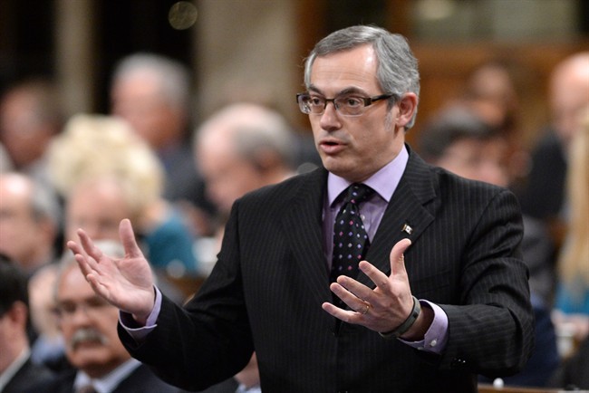 Treasury Board President Tony Clement responds to a question during question period in the House of Commons on Parliament Hill in Ottawa in January 2014. 