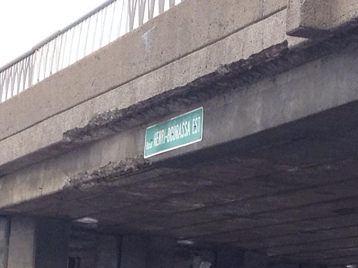 Huge sections of missing concrete from the Henri-Bourassa overpass in Montreal, where slab fell onto a car below on January 13, 2014.