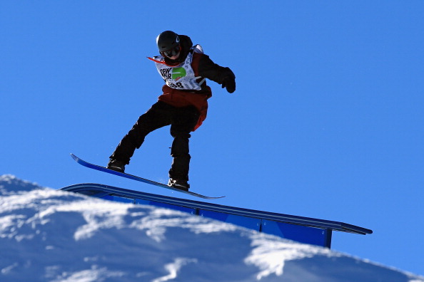 Maxence Parrot of Canada rides to third place in the men's snowboard slopestyle at the Dew Tour iON Mountain Championships on December 15, 2013 in Breckenridge, Colorado.