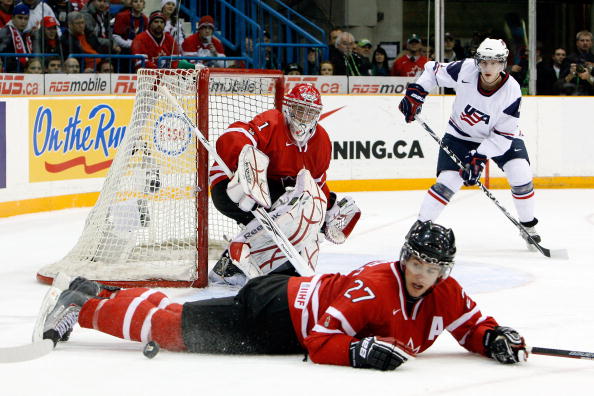 Alex Pietrangelo #27 of Team Canada blocks a pass to Matt Donovan #4 of Team USA in front of Jake Allen #1 during the 2010 IIHF World Junior Championship Tournament Gold Medal game on January 5, 2010 at the Credit Union Centre in Saskatoon.