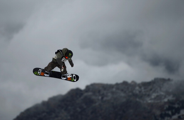 Canadian snowboarder Charles Reid competes in the Men's Slope Style final race at the Snowboard and FreeStyle World Cup Super finals at Sierra Nevada ski resort, near Granada on March 26, 2013. 