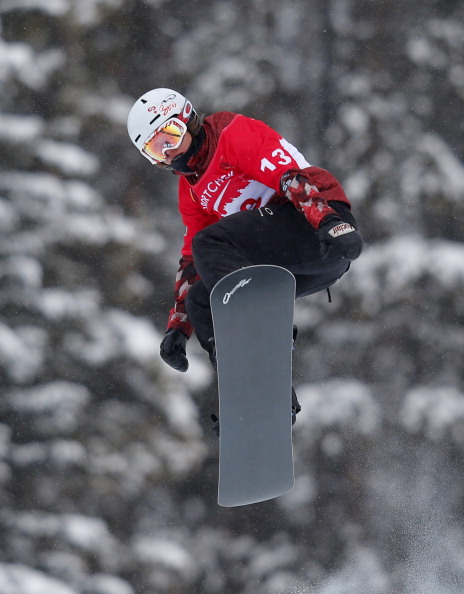 Maelle Ricker of Canada takes to the air during the women's qualification run at the FIS Snowboard Cross World Cup December 20, 2013 in Lake Louise, Alberta.