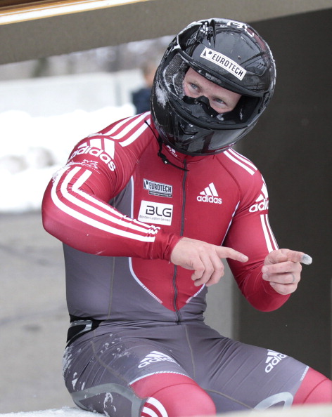 Lyndon Rush, driver of Canadian 1 sled, gestures after crashing in the FIBT men's bobsled world cup heat 1, on November 16, 2012 at Utah Olympic Park in Park City, Utah.