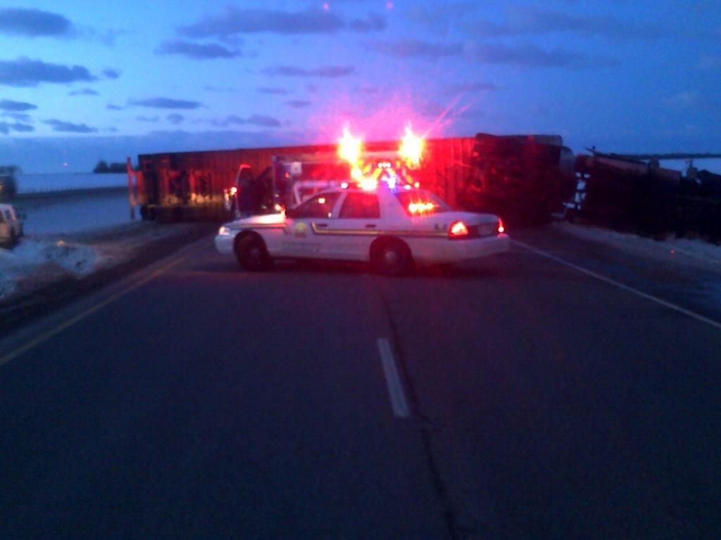 A semi rolled over on the Queen Elizabeth II Highway Wednesday morning, January 15, 2014.
