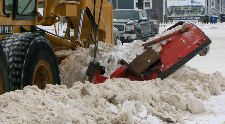 Plows dig out Saskatoon roads after first significant snowfall of the new year.