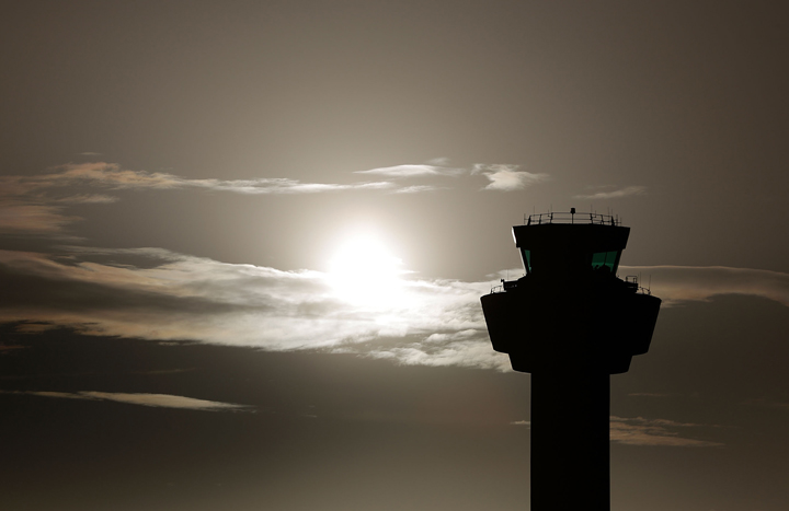 The sun rises over the control tower at Stansted Airport on November 14, 2013 in London, England.