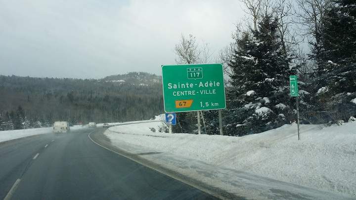 Sign on the highway to Ste. Adele, Que., the scene of a massive car pile up on January 27, 2014.