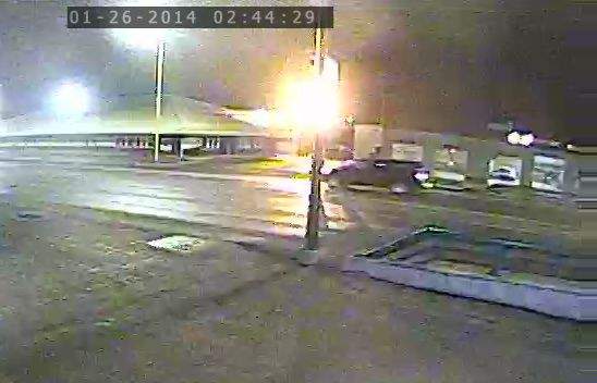 Surveillance footage of a SUV believed to be involved in a crash with a cyclist.