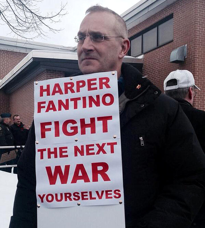 Veterans and supporters rally in Sydney, N.S., on Friday Jan. 31, 2014, protesting the government's closure of eight regional Veterans Affairs offices.