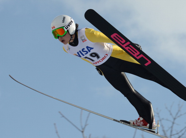 Atsuko Tanaka of Canada soars in the air during the World Cup women's ski jumping in Sapporo in Japan's northern island of Hokkaido on February 2, 2013.