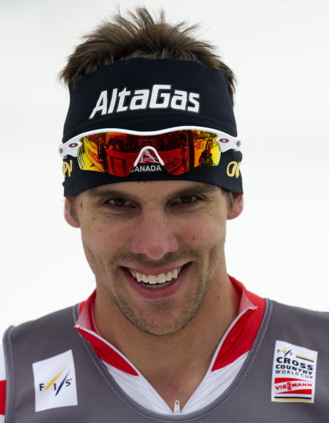 Canada's Len Valjas smiles as he crosses the finish line in the third place after the FIS Cross-Country World Cup Men 15km Classic Mass Start  in Falun, on March 17, 2012.  