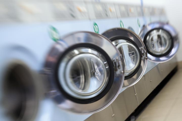 A naked Australian man who became stuck in a washing machine as part of an ill-planned practical joke was freed from the appliance with the help of an unusual rescue device: olive oil.