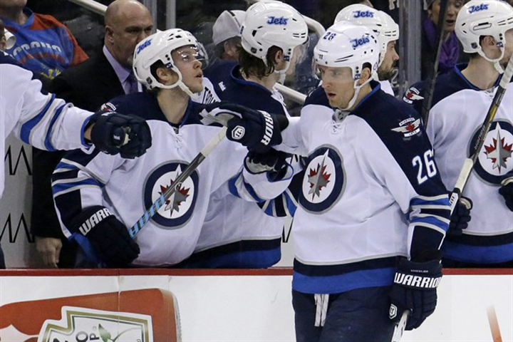 Winnipeg Jets forward Blake Wheeler (26) celebrates his goal in the second period of a heartbreaking loss to the Penguins in Pittsburgh on Sunday.