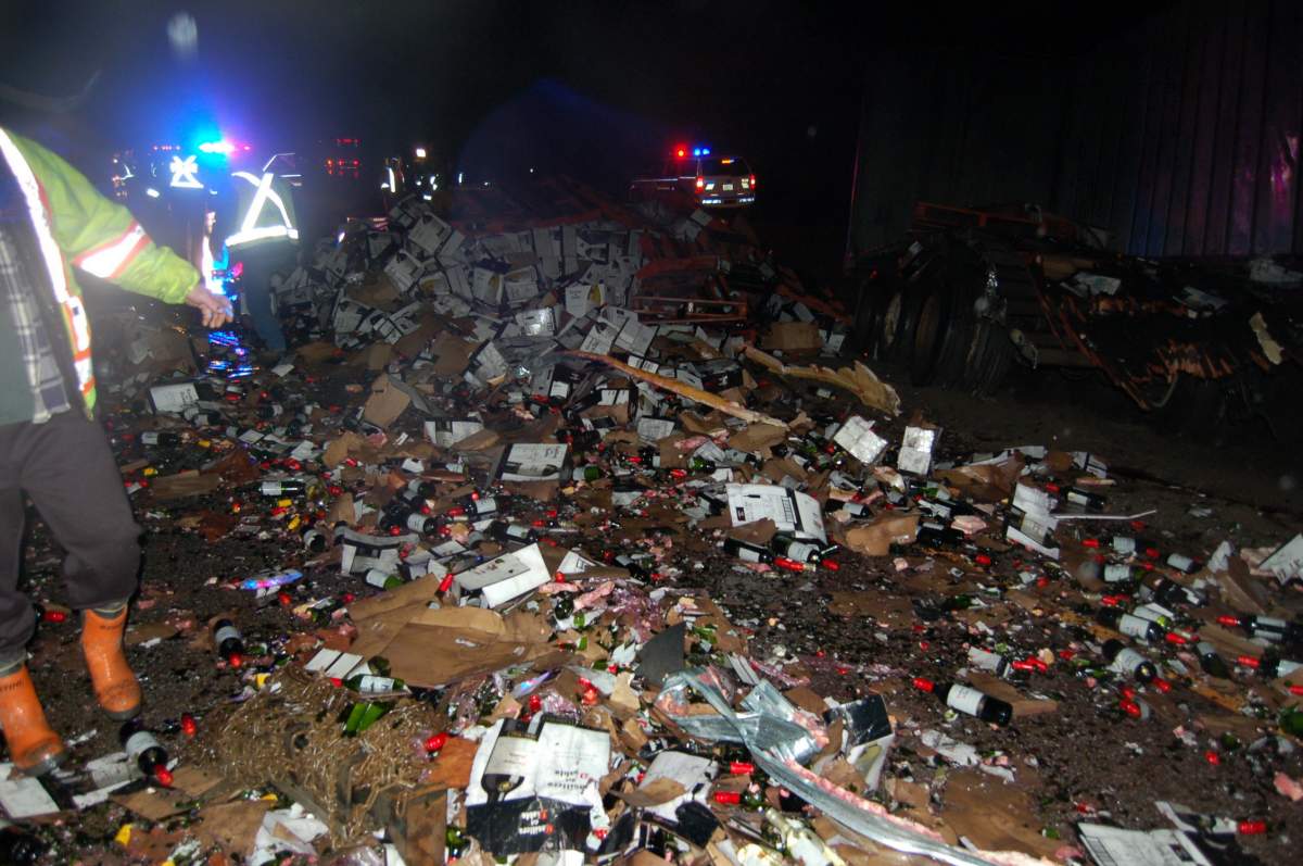 Police say a 30-year-old Abbotsford male was operating a Kenworth semi-trailer filled with wine, headed eastbound on Highway #1 when he lost control of the vehicle and drove through the centre median of the highway. 