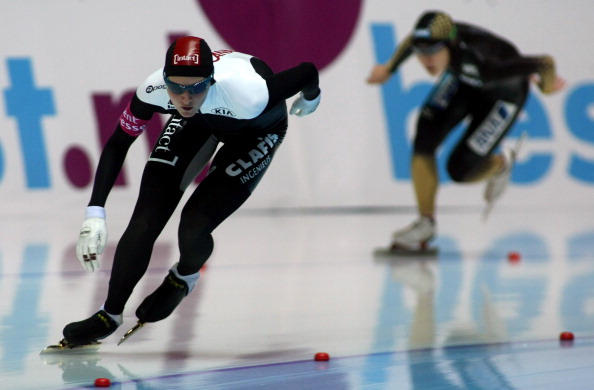  Danielle Wotherspoon of Canada (L) competes with Yukana Nishina of Japan in the Division A Women's 1000m race during the day one of the Essent ISU World Cup Speed Skating at Harbin Ice Training Base on December 15, 2012 in Harbin, China.