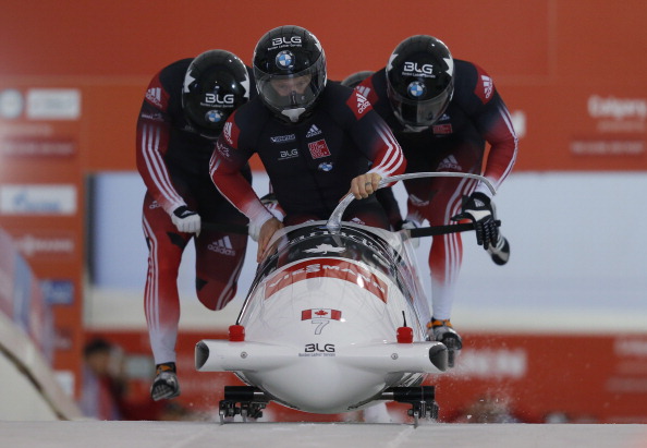 Lyndon Rush, David Bissett, Neville Wright and Lascelles Brown of Canada compete in the men's four man bobsleigh first run during the 2013 IBSF World Cup race November 30, 2013 in Calgary, Alberta, Canada.
