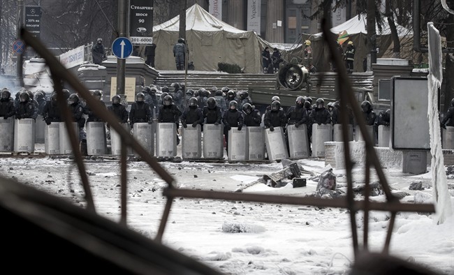 Ukraine's parliament has passed a measure offering amnesty to arrested protesters, but only if demonstrators vacate most of the buildings they occupy.