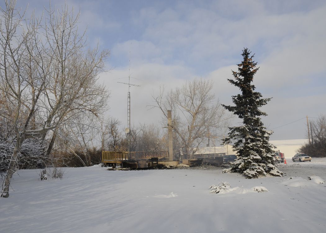 Photograph of Klaus residence in Castor, Alberta, at the end of the fire.