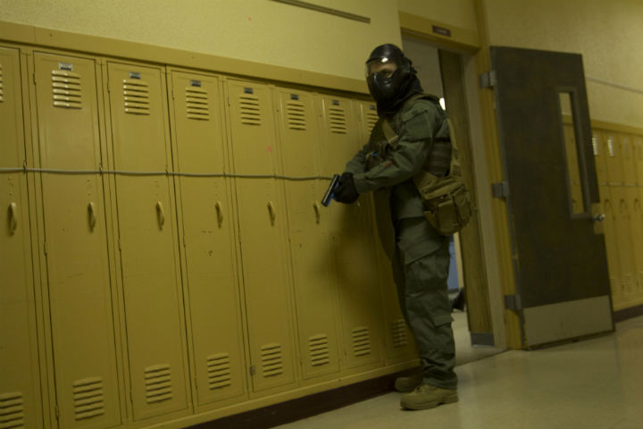 A law enforcement official takes part in a training demonstration at the Advanced Law Enforcement Rapid Response Training Center at Texas State University.