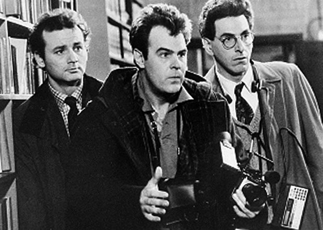 In an undated file photo, Bill Murray, Dan Aykroyd, center, and Harold Ramis, right, appear in a scene from the 1984 movie “Ghostbusters”.