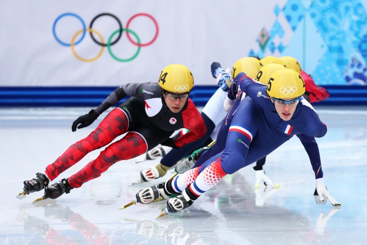 Marie-Eve Drolet of Canada (L) and Veronique Pierron of France skate during the Ladies' 1500m Short Track Speed Skating heats on day 8 of the Sochi 2014 Winter Olympics at the Iceberg Skating Palace on February 15, 2014 in Sochi, Russia. (Photo by Paul Gilham/Getty Images).